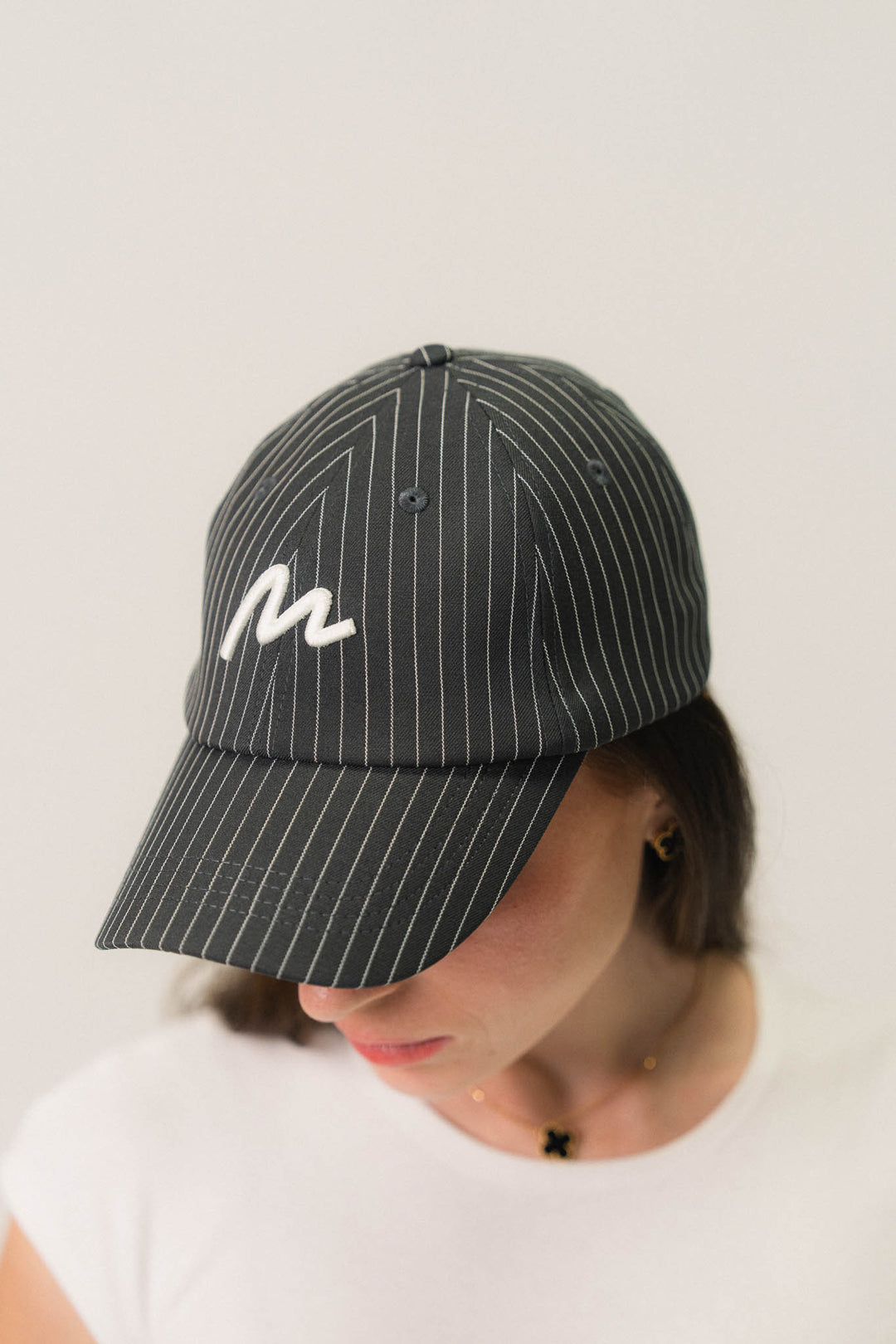 Casquette rayée brodée signature